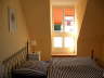 Schlafzimmer mit Balkon